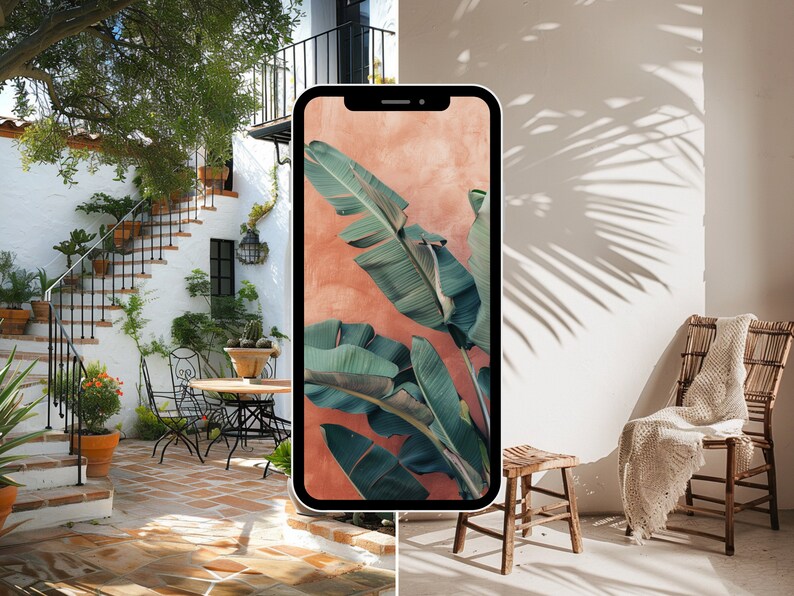 May include: A smartphone displaying a tropical leaf wallpaper with a peach background. The phone is in front of a white wall with a wooden chair and a white throw blanket.