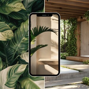 May include: A smartphone displaying a photo of a modern outdoor bathroom with a concrete wall, a wooden deck, and lush greenery. The photo is taken from a low angle, showcasing the bathroom's minimalist design.