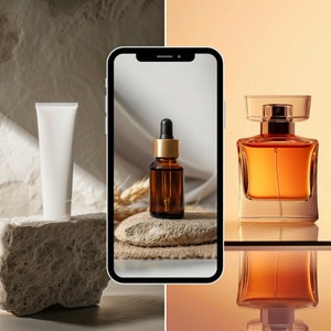 May include: A white tube of cream, a brown glass bottle with a dropper, and a clear glass bottle of perfume with a gold cap. The products are displayed on a stone surface and a smartphone screen.