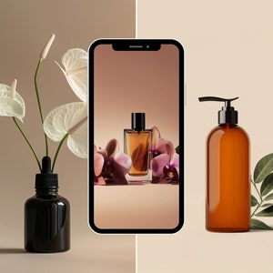 May include: A smartphone displaying a photo of a brown glass bottle of perfume with a black cap and a floral background.  A brown glass bottle with a black pump dispenser and a green leaf are on a beige surface.