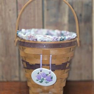 1994 Longaberger May Series Lilac Basket, Floral Liner, Plastic Protector, Pottery Tie On