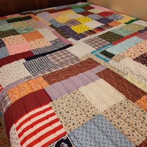 Handmade colourful  queen size patchwork quilt by Women of Tutwiller