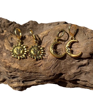 Handmade gold sun and moon charm earrings