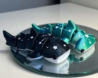 Juguete antiestrés flexible articulado con forma de tiburón martillo, estrella, galaxia y vida marina. Adorno para bolso.