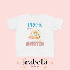 Donut Pre-K acabou de ficar muito mais doce letras de donut afirmação positiva eu sou inteligente camiseta infantil macia premium