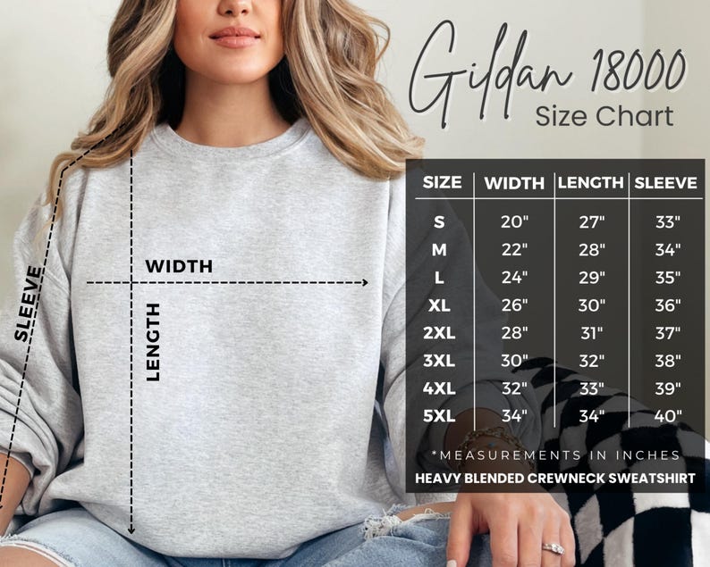 May include: Size chart for Gildan 18000 heavy blended crewneck sweatshirt. The chart shows measurements in inches for width, length, and sleeve length for sizes S through 5XL.