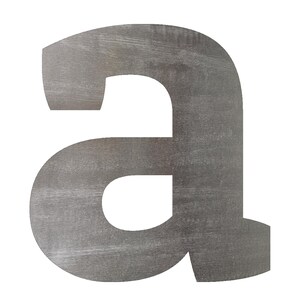 May include: A lowercase letter "a" cut from a sheet of brushed metal. The letter is in a sans-serif font and has a slightly textured surface. The metal has a silver-gray color and is set against a white background.