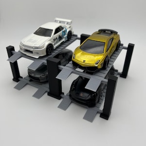 Hotwheels 4 Post Lift Diecast Matchbox 4 car Display 1:64 Scale