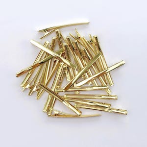 Elegant Gold  Plate no turn Hair Clips 3 in long  
Gold plate 1 pair (2) clips Amazon.com : AOZUO 2Pcs French Gold Hair Clips, Metal Hair  main image 4