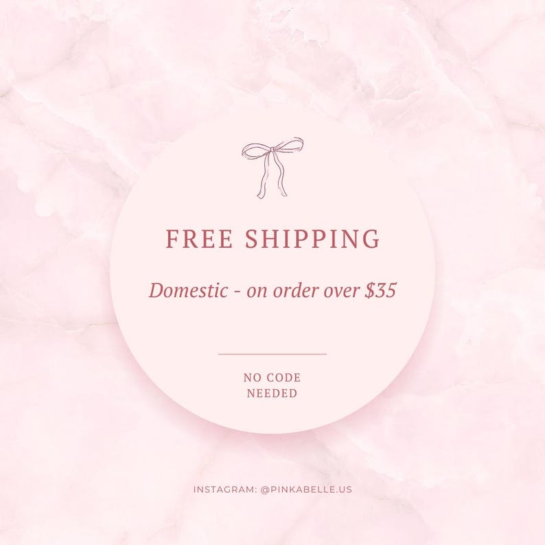 May include: A pink and white marble background with a circular graphic. The graphic features the words "FREE SHIPPING" in a serif font, along with the text "Domestic - on order over &pound;35" and "NO CODE NEEDED". The Instagram handle @PINKABELLE.US is at the bottom.