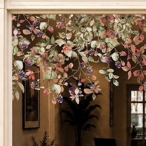 May include: A decorative window film featuring a detailed botanical illustration of blackberry vines with green and reddish-brown leaves, small pink flowers, and clusters of dark purple and light pink blackberries hanging from thin branches.