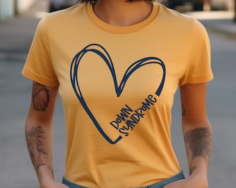 May include: A yellow t-shirt with a blue heart graphic and the text "Down Syndrome" inside the heart.