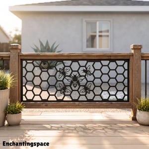 May include: A black metal decorative panel featuring a repeating honeycomb pattern with five bee silhouettes integrated into the design. The rectangular panel is mounted between two wooden posts on a deck, with the text Enchantingspace visible.