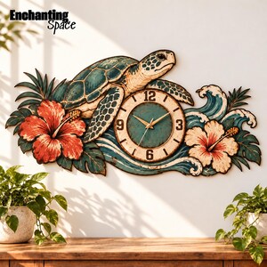 May include: A wall clock featuring a sea turtle, blue ocean waves, and large red and white hibiscus flowers. The clock face is circular with black numbers 3, 6, 9, and 12, and gold-toned hands. The text Enchanting Space is in the top left corner.