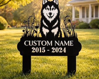 May include: Black metal garden stake featuring a stylized husky dog design. The sign includes the text "CUSTOM NAME 2015 - 2024" in white lettering. The dog is set against a backdrop of stylized grass and flowers.