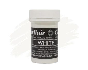May include: A white plastic jar of Sugarflair white food coloring concentrate. The jar has a black label with the words "Sugarflair Concentrate to Colour Icing" and "White" in white letters. The label also includes a small sun icon.