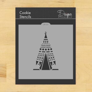 May include: A black and white stencil of a teepee with geometric patterns. The stencil is on a gray background and is labeled "Cookie Stencils" and "Designer Stencils".