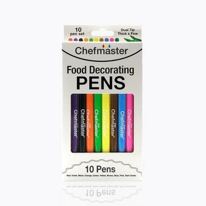 May include: A box of Chefmaster food decorating pens. The box is white with the words "Food Decorating PENS" in large black letters. The box contains 10 pens in various colors, including red, violet, black, orange, green, yellow, brown, blue, pink, and dark green.
