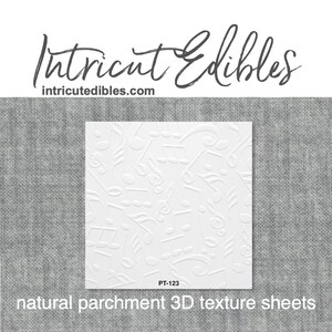 May include: White natural parchment 3D texture sheet with a repeating pattern of musical notes. The sheet is labeled "PT-123" and "Intricut Edibles" with the website "intricateedibles.com".
