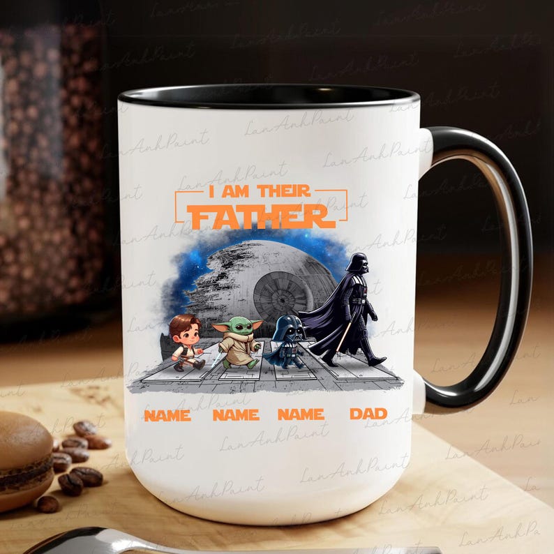 May include: White ceramic mug with a black handle and rim, featuring a Star Wars theme. The design includes the text "I AM THEIR FATHER" and illustrations of characters like Darth Vader and Baby Yoda. The mug is approximately 4 inches tall.
