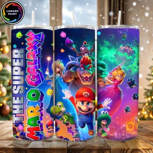 May include: Three stainless steel tumblers with straws, each featuring a vibrant design from "Mario Galaxy." The first tumbler displays the text "The Super Mario Galaxy." The other two tumblers feature Mario, Princess Peach, and other characters.