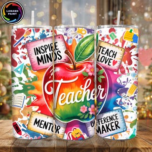 May include: A colorful tumbler with a teacher theme. The design features a large apple with the word "Teacher" and the phrases "Inspire Minds," "Teach Love," "Mentor," and "Difference Maker." The tumbler has a straw and a lid.
