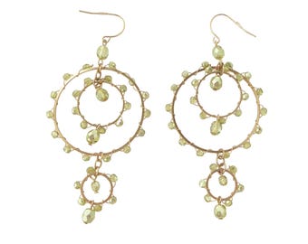 2000s Y2K Vintage 3.75" light green beaded gold circles bohemian festival dangly circular long statement earrings