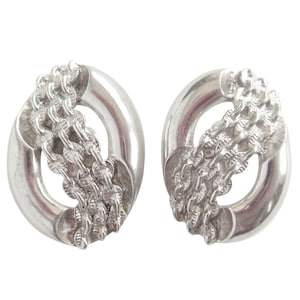 1960s Vintage Monet silver oval chain link industrial chunky shiny retro statement signed designer huggie style clip on earrings