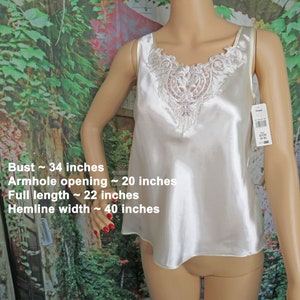 34&quot; bust Enchanting camisole, Paper hang tag Never worn, White polyester sleeveless, Low cut lace neck pullover, Made in Philippines, VTG