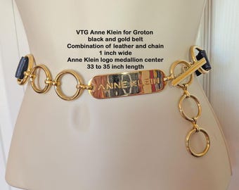 Pasek VTG Anne Klein dla Groton w kolorze czarno-złotym, połączenie skóry i łańcuszka, szerokość 1 cala, medalion z logo Anne Klein w centrum, długość 33/35 cala