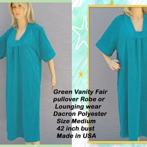 May include: A teal green pullover robe or lounging wear made of Dacron Polyester. The robe has a V-neck and short sleeves. The bust size is 42 inches. Made in the USA.