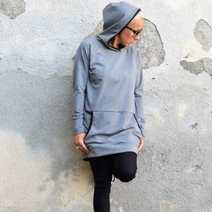 Hoodie sweater dress in gray with kangaroo pocket and sporty casual look image 1