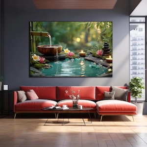 May include: A large canvas print of a zen garden scene. A wooden bowl with flowing water, surrounded by flowers, candles, and a small bridge. The water is a tranquil turquoise colour, and the background is lush greenery.