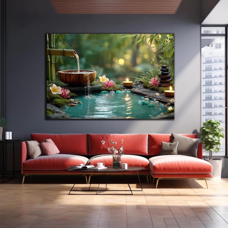 May include: A large canvas print of a zen garden scene. A wooden bowl with flowing water, surrounded by flowers, candles, and a small bridge. The water is a tranquil turquoise colour, and the background is lush greenery.
