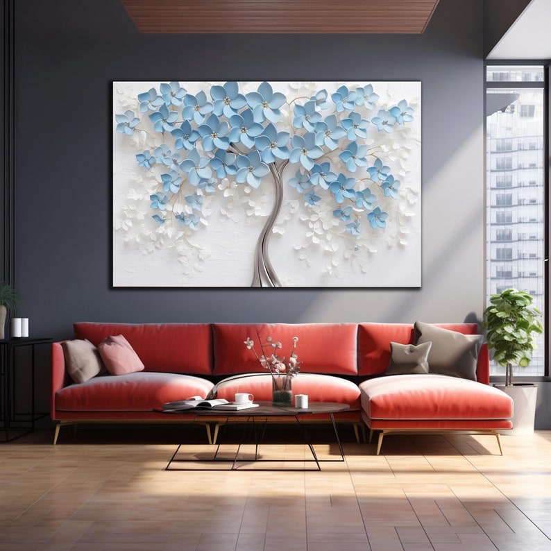 May include: A red sectional sofa with two pillows, a coffee table with a vase of flowers, and a large framed print of a blue and white floral design on the wall.