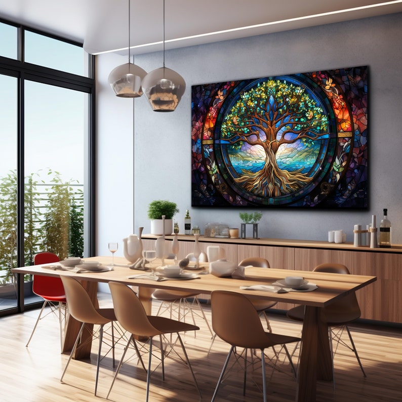May include: A stained glass style artwork depicting a tree of life with colourful leaves and roots. The tree is surrounded by a circular frame with a blue sky and water at the base. The artwork is displayed in a modern dining room with a wooden table and chairs.