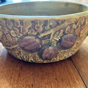 Original Weller Ceramic Vase with unique grape design! A fabulous addition. Good condition with little wear as shown and sold as is.