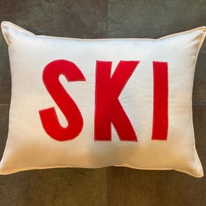Ski chalet alpine pillow about 12"X 16" with red felt and natural fabric skiing