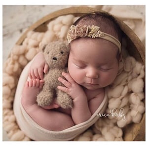 Hand knitted little teddy bear