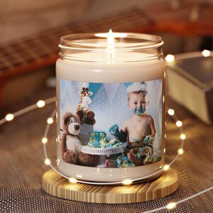 A Custom Photo Candle. Features Example Of Baby Eating Birthday Cake. A Family Photo Gift Or Personalized Photo Birthday Gift. A Scented Candle Anniversary Gift. A Picture Candle Graduation Gift Idea. A Long Distance Boyfriend Gift.