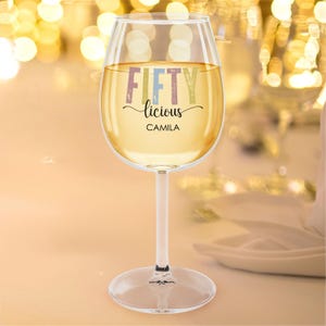 Celebrate a milestone with this 50th birthday custom wine glass with stem! Featuring the fun Fiftylicious wine cup design and custom name, it makes the perfect birthday gift for women. This personalized wine gift for friend is a thoughtful way to mark the occasion and is an ideal turning 50 gift for her or a unique 50th birthday keepsake.