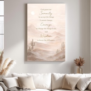May include: Canvas art print featuring a desert landscape with cacti and mountains in muted tones. The artwork displays the text "God grant me Serenity...Courage...Wisdom" in elegant script, suitable for home decor.