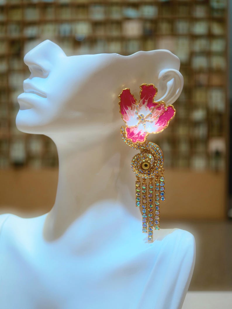 Elongated tassel design to enhance neckline elegance