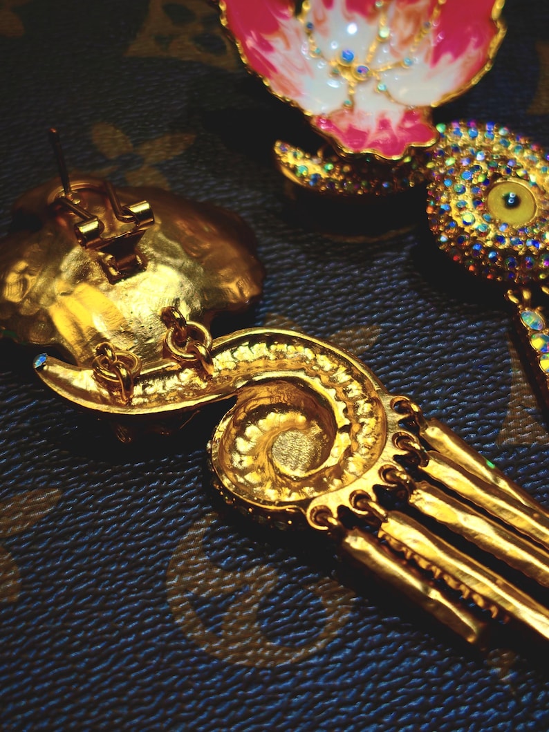 Back view showing handcrafted structure and gold finish