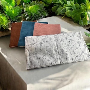 Funda de libro para colorear de pana para mantener a tus hijos ocupados, lavable y reutilizable en un instante.
