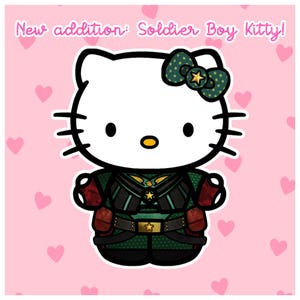 May include: A cartoon cat character in a military-style outfit, with a green and gold bow. The outfit includes a green jacket, black trousers, and red accents. Text at the top reads "New addition: Soldier Boy Kitty!"