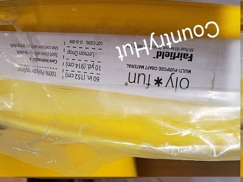 May include: A roll of yellow 100% polypropylene craft material, labeled "Oly *fun" Multi-Purpose Craft Material" with instructions for care and cleaning. The roll is 60 inches (152 cm) long and 10 yards (914 cm) wide.