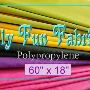 May include: A stack of colorful polypropylene fabric in various shades of yellow, green, purple, pink, and blue. The fabric is 60 inches by 18 inches and is labeled "Oly Fun Fabric".