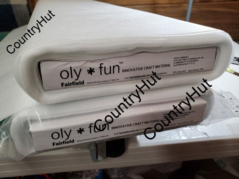 May include: Two rolls of white, soft, and flexible craft material. The packaging is white with black text that reads "oly * fun" and "Fairfield" with the trademark symbol. The text "INNOVATIVE CRAFT MATERIAL" is also printed on the packaging.