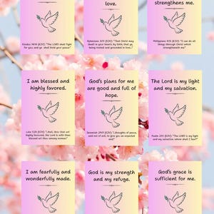 May include: A collection of nine cards with inspirational quotes and Bible verses, each featuring a dove carrying an olive branch. The cards have a gradient background and are set against a backdrop of pink flowers.